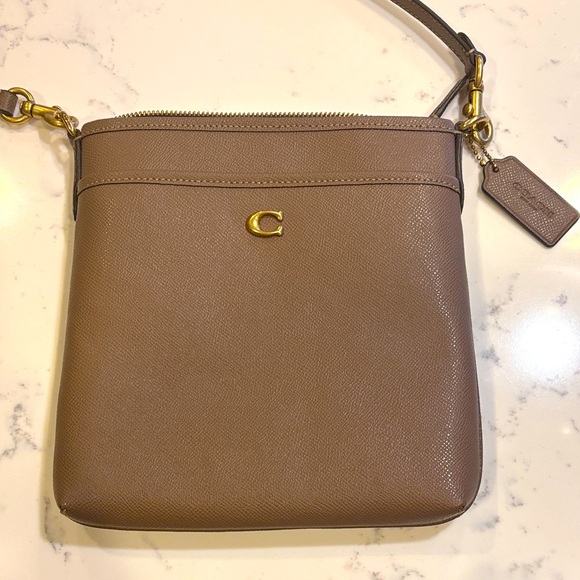 Coach Handbags - Coach taupe Crossbody Bag with Gold Accents